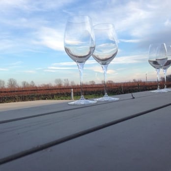 Niagara Vintage Wine Tours - Stonebrook Winery - patio overlooking vineyards - Wine Tours Near Me - Niagara Falls, Ontario Niagara Vintage Wine Tours - Stonebrook Winery - patio overlooking vineyards - Wine Tours Near Me - Niagara Falls, Ontario