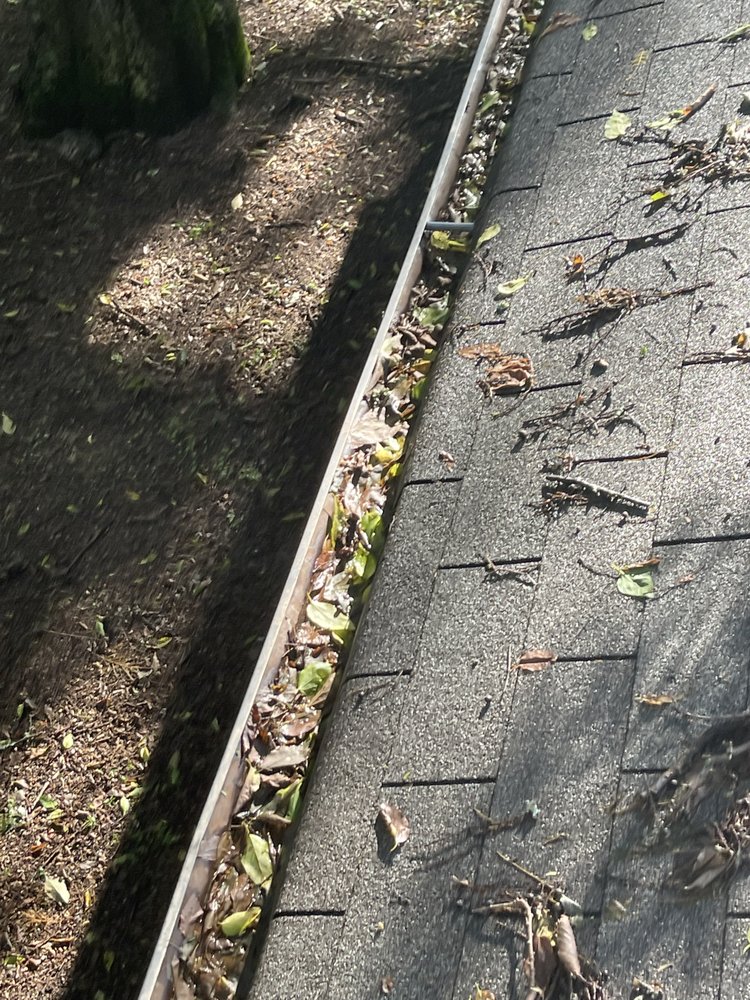 Slide of Marcus Gutters Cleaning