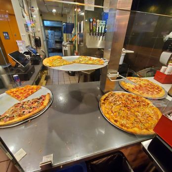 Pleasure Pizza - Slices behind the counter - Pizza Near Me - Santa Cruz, California Pleasure Pizza - Slices behind the counter - Pizza Near Me - Santa Cruz, California