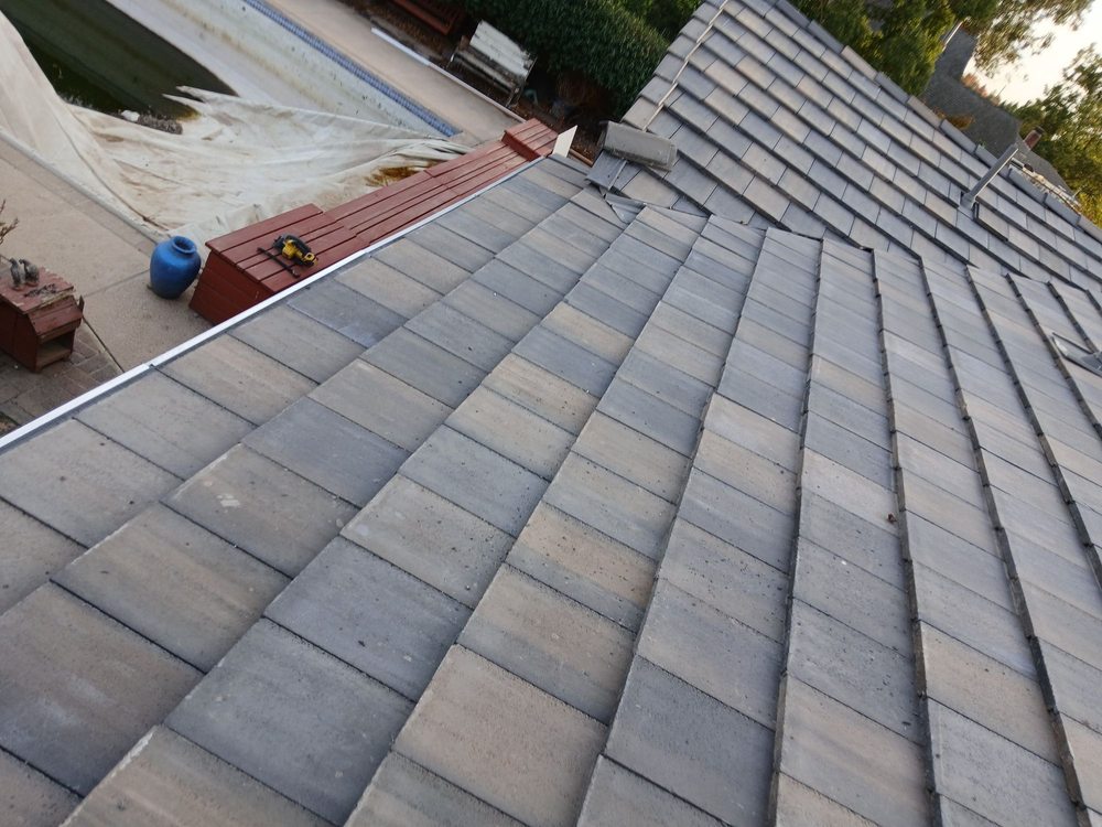 Slide of Prestige Roofing
