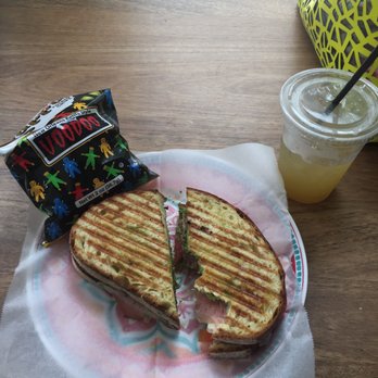 Circe's Grotto - Fresh mozzarella with pesto spread, tomato and mozzarella on sourdough. As always, I forgot about the picture until I'd already bitten in. - Sandwiches Near Me - Charleston, South Carolina