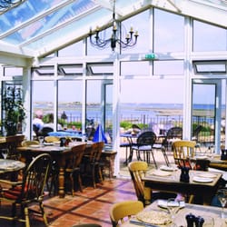 The White Horse - Conservatory Restaurant looking across tidal marsh