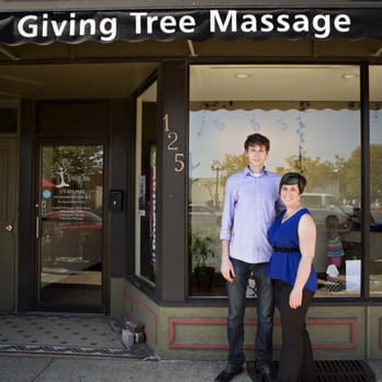 Giving Tree Massage - Owner, Stephanie Honderich, and her husband Mike in front of the studio. - Massage Therapy Near Me - Goshen, Indiana Giving Tree Massage - Owner, Stephanie Honderich, and her husband Mike in front of the studio. - Massage Therapy Near Me - Goshen, Indiana