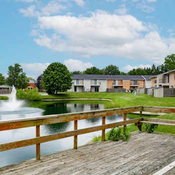 Williamsburg on the Lake Apartments in Mishawaka - Deck overlooking a pond at Williamsburg on the Lake Apartments Mishawaka - Apartments Near Me - Mishawaka, Indiana Williamsburg on the Lake Apartments in Mishawaka - Deck overlooking a pond at Williamsburg on the Lake Apartments Mishawaka - Apartments Near Me - Mishawaka, Indiana