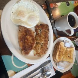 Breakfast special with 2 eggs, boneless pork steak, hash browns and wheat toast plus coffee. Breakfast special with 2 eggs, boneless pork steak, hash browns and wheat toast plus coffee.