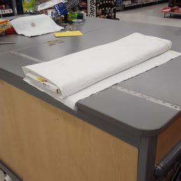 a counter with a roll of paper on it