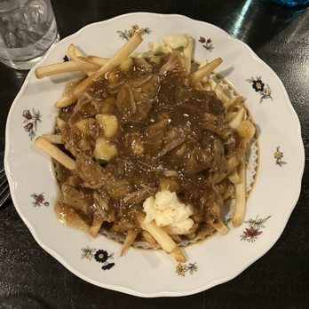 WALDHAUS - Poutine appetizer - Pubs Near Me - Banff, Alberta WALDHAUS - Poutine appetizer - Pubs Near Me - Banff, Alberta
