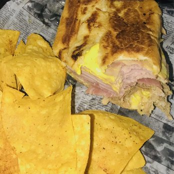Gulfport Brewery and Eatery - Here's a Cuban sandwich close up with a flash if that helps to see the inside is filling - Breweries Near Me - Gulfport, Florida