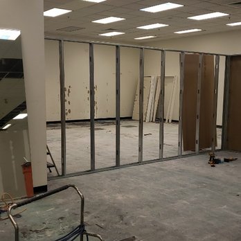 Goldleaf Home Improvement - These are the walls being framed out. Then we hang the drywall then we tape and texture then we paint and its ready for graphics - General Contractors Near Me