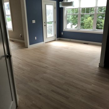 Taozen Floors Services - downstairs open space, sanded and pre-stain - Flooring Near Me - Waltham, Massachusetts