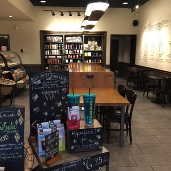 Starbucks - Long table and coffee goods - Coffee & Tea Near Me - Calgary, Alberta Starbucks - Long table and coffee goods - Coffee & Tea Near Me - Calgary, Alberta