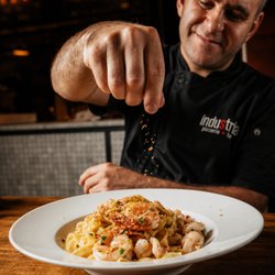 Industria Pizzeria + Bar - Tagliatelle, crevettes et une touche fraîche de citron. 

Tagliatelle, shrimp & a fresh touch of lemon.