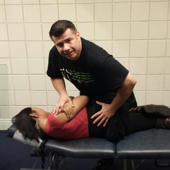 Jr Marco A Dardon, DC - Helping ease a patient's low back pain with a side-posture lumbar spine mobile chiropractic adjustment at her office. - Chiropractors Near Me - Temple City, California Jr Marco A Dardon, DC - Helping ease a patient's low back pain with a side-posture lumbar spine mobile chiropractic adjustment at her office. - Chiropractors Near Me - Temple City, California