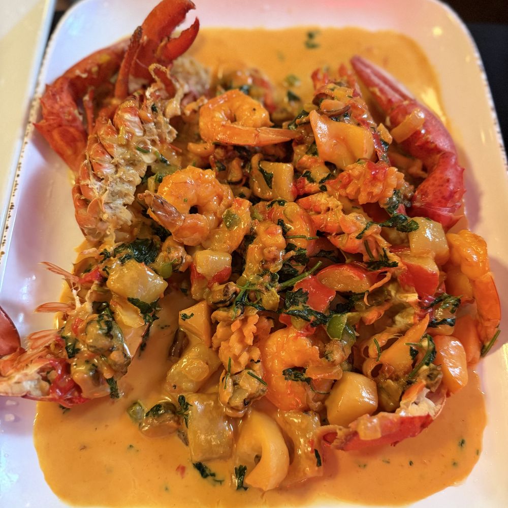 Sabor Centroamericano - Langosta rellena - Peruvian Near Me - Chelsea, Massachusetts Sabor Centroamericano - Langosta rellena - Peruvian Near Me - Chelsea, Massachusetts