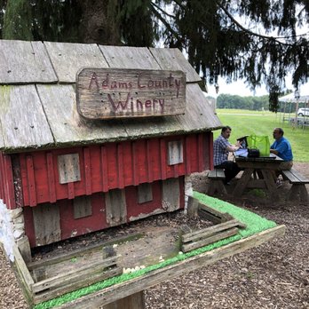 Adams County Winery - people sitting at a picnic table - Beer, Wine & Spirits Near Me - Gettysburg, Pennsylvania