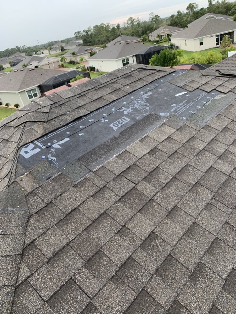 Slide of E&C Roofing and More