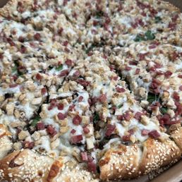 Chicken Parm & Spinach Pizza with twisted sesame crust