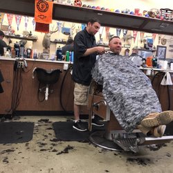 Paradise Park Barber Shop - That's Ryan. Go see him. Best in the business..