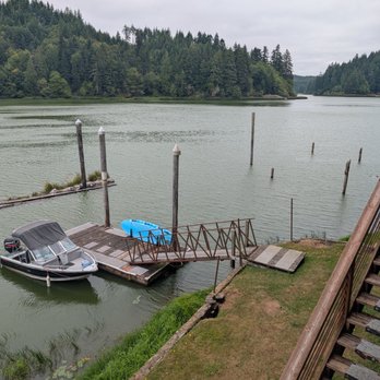 Lakeside Marina - Boat in front of cabin - Boat Repair Near Me - Lakeside, Oregon Lakeside Marina - Boat in front of cabin - Boat Repair Near Me - Lakeside, Oregon