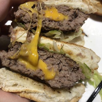 Topgolf - Cheddar stuffed sliders! Cooked to perfection, delicious - New American Near Me - Orlando, Florida Topgolf - Cheddar stuffed sliders! Cooked to perfection, delicious - New American Near Me - Orlando, Florida