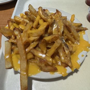 Johnnie's Charcoal Broiler - Small French Fries with Cheese - American Near Me - Moore, Oklahoma Johnnie's Charcoal Broiler - Small French Fries with Cheese - American Near Me - Moore, Oklahoma