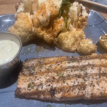 Cork & Pig Tavern - Grilled salmon and roasted cauliflower with side of garlic aioli - New American Near Me - Odessa, Texas