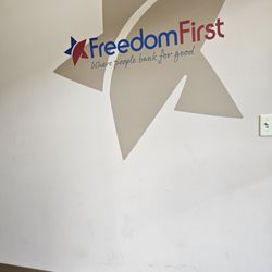 Freedom First Federal Credit Union Towers Branch - The artwork design of the logo of Freedom First Credit Union located on the wall at the right side as you enter the building.