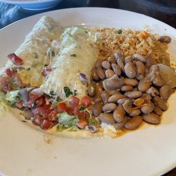 El Charro Cafe - Enchiladas del Rancho - Slow Cooked Pork Carnitas with Green Chile Raja Crema Sauce & Queso Casero - Mexican Near Me - Tucson, Arizona