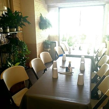 The Parrish House - a dining room with a table and chairs - American Near Me - Adel, Georgia