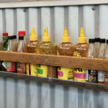 Snow City Cafe - Hot sauce rack - Breakfast & Brunch Near Me - Anchorage, Alaska