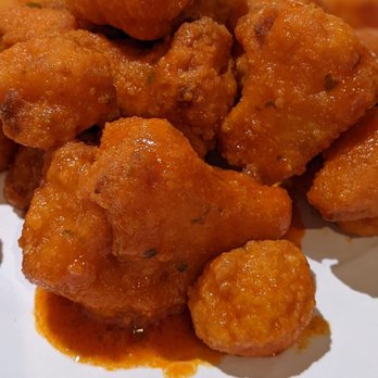 Sammy's Pizza Restaurant & Pub - Deep fried cauliflower with the buffalo sauce fried in... This is the way that veggie wings should be! - Pizza Near Me - Eau Claire, Wisconsin