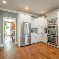 Woodtryst - we refinished this kitchen from a natural brown to a bright white