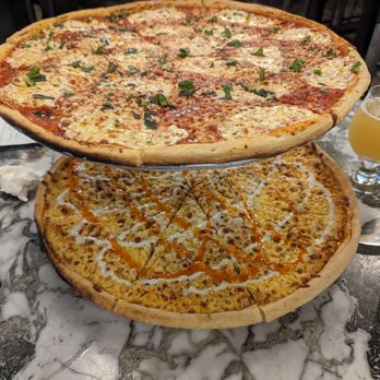 Revolution - Top: Margherita Pizza Bottom: Buffalo Chicken Pizza - German Near Me - Morristown, New Jersey