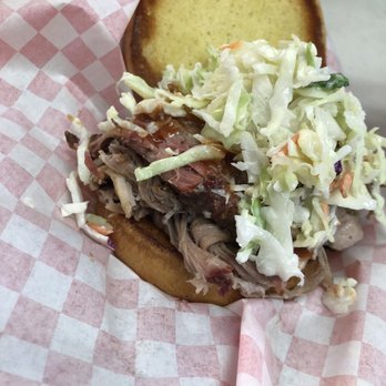 Roland's BBQ - a pulled pork sandwich with coleslaw - Barbeque Near Me - Donnelly, Idaho Roland's BBQ - a pulled pork sandwich with coleslaw - Barbeque Near Me - Donnelly, Idaho