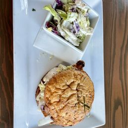 Fried chicken sandwich with house slaw Fried chicken sandwich with house slaw