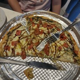 My daughter loves the GF pesto pizza with basalmic glaze and fresh tomatoes. This is the 4th time she has had it with no issue. My daughter loves the GF pesto pizza with basalmic glaze and fresh tomatoes. This is the 4th time she has had it with no issue.