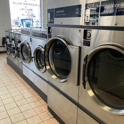 Whyte Avenue Laundromat & Drycleaning - The dryers are very large and I usually can combine 3 loads into one but definitely dry faster if only one load inside. Runs on quarters