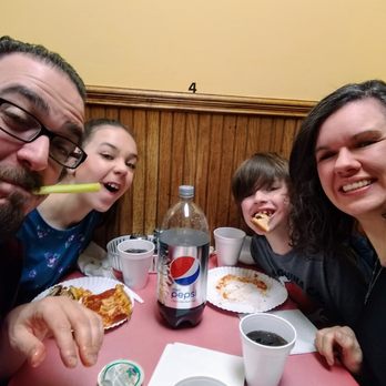 Donatello's Restaurant - Smooshed into one of the little booths--it's what fam' does. :-) - Pizza Near Me - Niagara Falls, New York