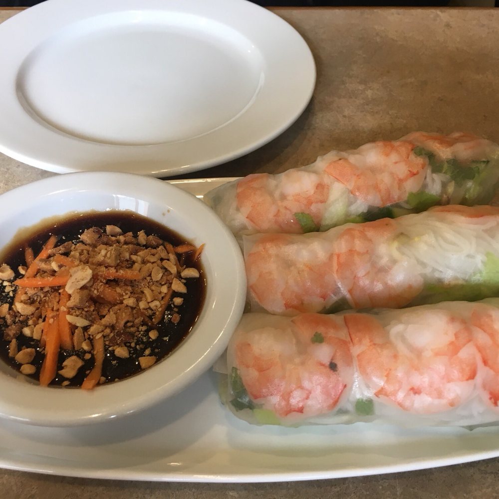 Cambodiana Restaurant - a plate of food and a bowl of dipping sauce - Cambodian Near Me - Kingston, Ontario