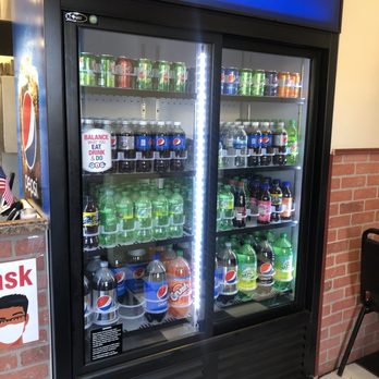 Janos Pizza - a vending machine filled with drinks - Pizza Near Me - Alpine, California