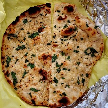Bawarchi Tandoori - Garlic Naan. $2.75. - Pakistani Near Me - Corona, California