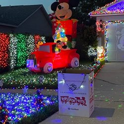 Streamside Drive Christmas Light - Toys for tots