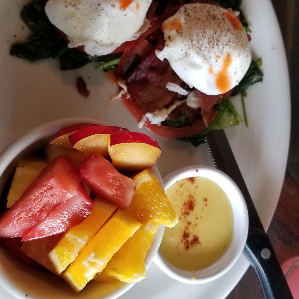 Pinky's - Blackstone Benny, no English muffin, hollandaise on the side and fresh fruit including sweet sliced plums! Sooo good!! - Coffee & Tea Near Me - Tampa, Florida Pinky's - Blackstone Benny, no English muffin, hollandaise on the side and fresh fruit including sweet sliced plums! Sooo good!! - Coffee & Tea Near Me - Tampa, Florida