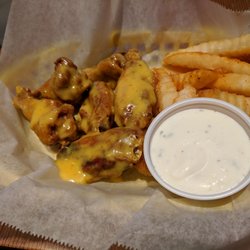 Wingers Sports Grill - Honey mustard wings and fries