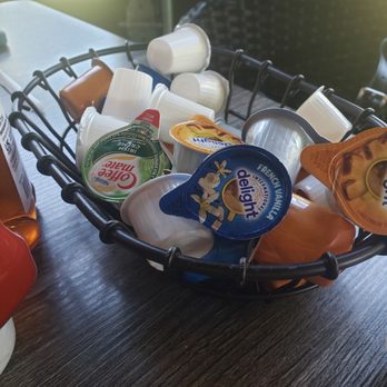 Our Place Restaurant - Variety of creamer, Irish Creme is there! - New American Near Me - Mansfield, Texas