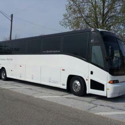 DJ Specialists & Limousines - 45 Passenger Luxury Motor coach