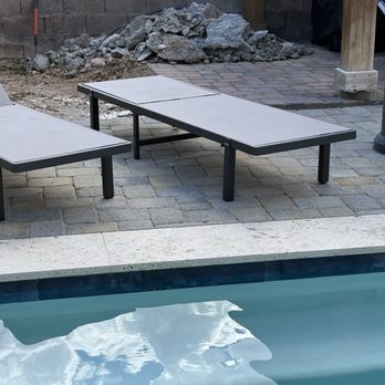 Premier Pool and Spa - Part of the pool with my unfinished landscaping because the pile of concrete has not been removed yet. It's a little 2 months old today! - Pool & Hot Tub Service Near Me - Las Vegas, Nevada
