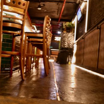Lounge 43 - a row of wooden chairs in a restaurant - Lounges Near Me - The Bronx, New York