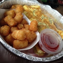 Bacon, american cheese, green peppers & onions omelet with a side of tater tots.