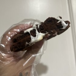 Warm chocolate cookie filled with marshmallows topped with peppermint!